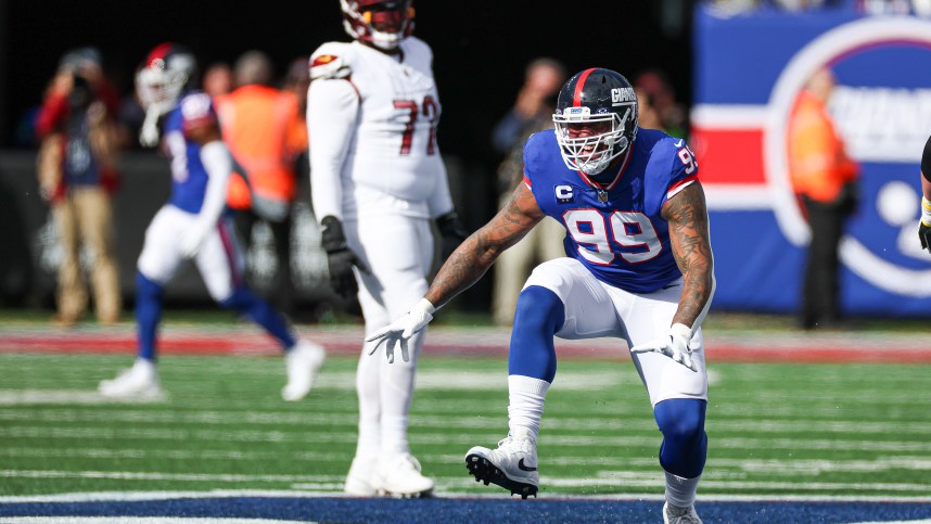 New York Giants defensive end Leonard Williams (99) celebrates a defensive stop during the first half against the Washington Commanders at MetLife Stadium
