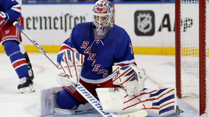 New York Rangers goaltender Igor Shesterkin (31) makes a save against the Arizona Coyotes during the first period at Madison Square Garden