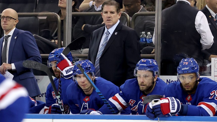 New York Rangers head coach Peter Laviolette coaches against the Arizona Coyotes during the third period at Madison Square Garden