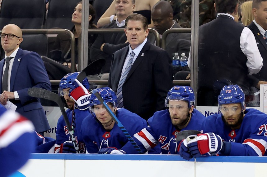 New York Rangers head coach Peter Laviolette coaches against the Arizona Coyotes during the third period at Madison Square Garden