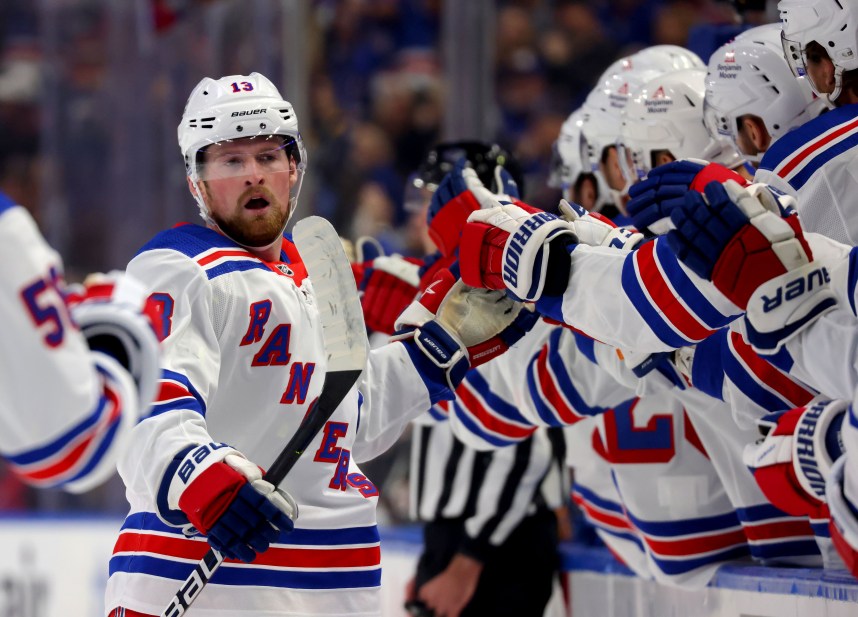 New York Rangers left wing Alexis Lafreniere (13) celebrates his goal with teammates during the first period against the Buffalo Sabres at KeyBank Center
