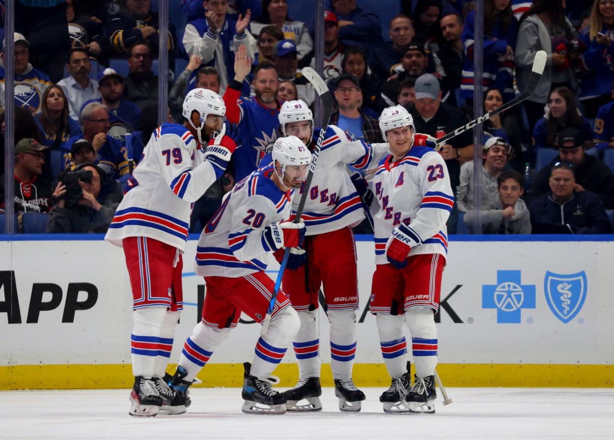 New York Rangers left wing Chris Kreider (20) celebrates his goal with teammates during the third period against the Buffalo Sabres at KeyBank Center