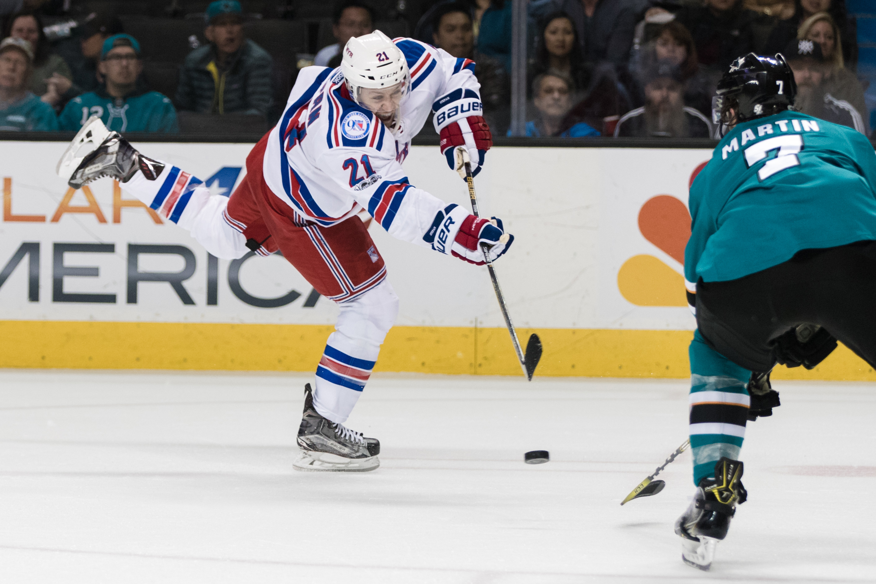 New York Rangers center Derek Stepan (21) shoots against the San Jose Sharks in the second period at SAP Center at San Jose.