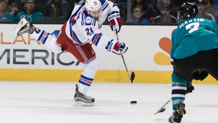 New York Rangers center Derek Stepan (21) shoots against the San Jose Sharks in the second period at SAP Center at San Jose.