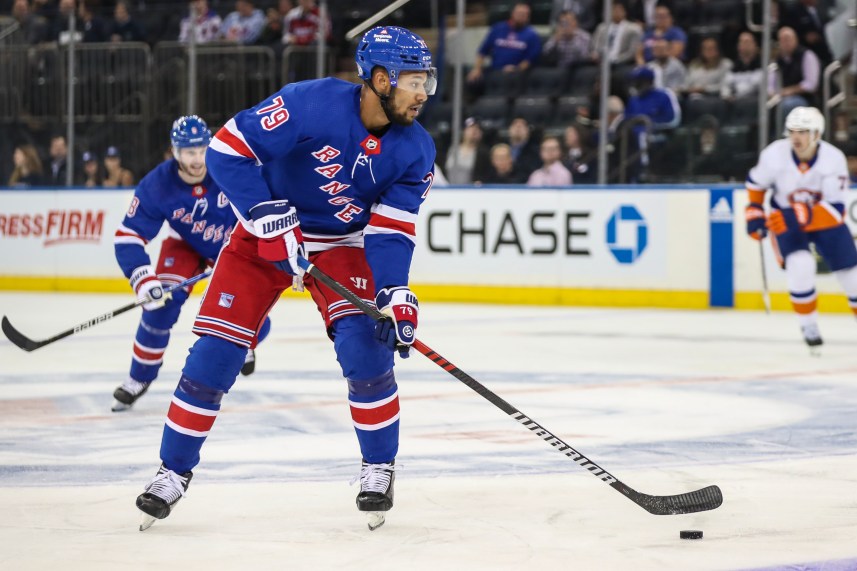 New York Rangers defenseman K'Andre Miller (79) controls the puck in the first period against the New York Islanders at Madison Square Garden
