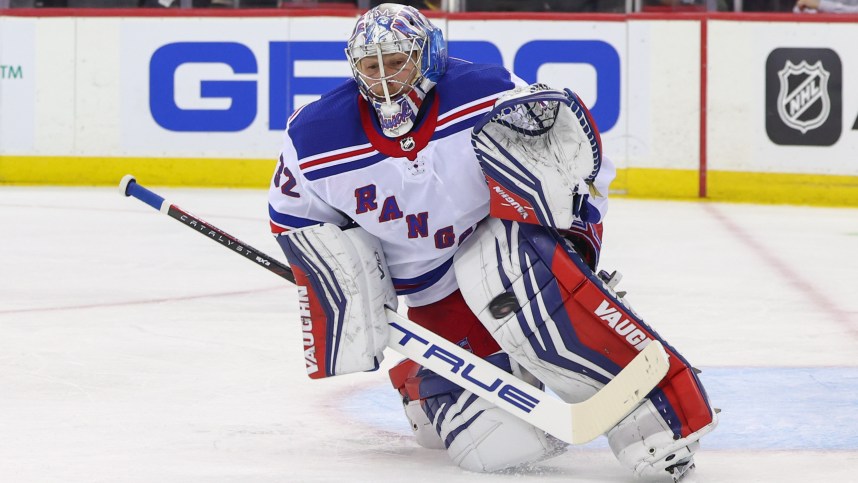 New York Rangers goaltender Jonathan Quick (32) makes a save against the New Jersey Devils during the second period at Prudential Center