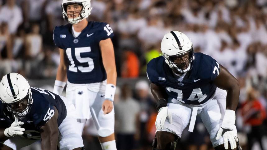 Penn State left tackle Olu Fashanu (New York Giants prospect) (74) gets set before a play against West Virginia at Beaver Stadium September