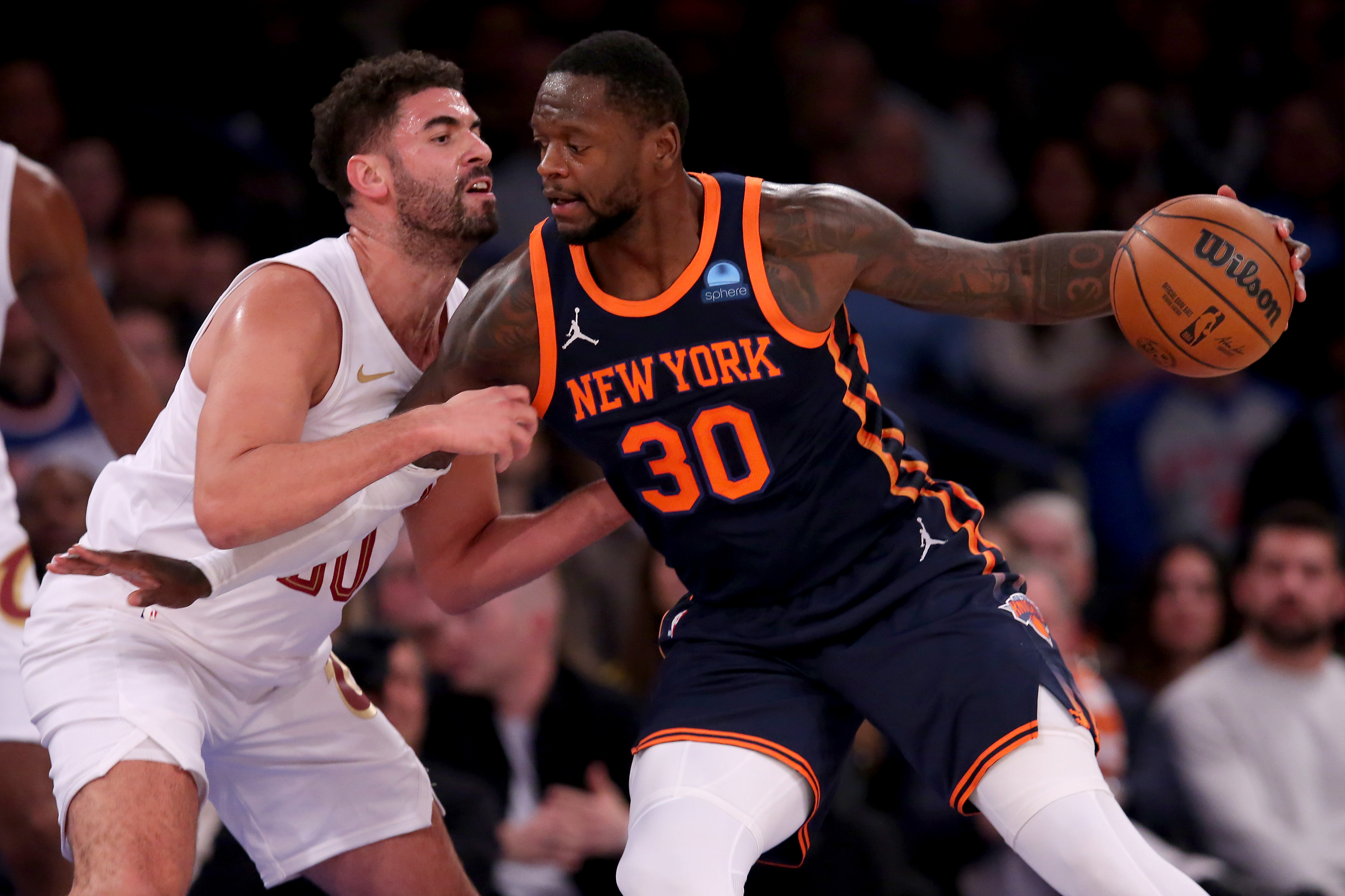 New York Knicks forward Julius Randle (30) controls the ball against Cleveland Cavaliers forward Georges Niang (20) during the first quarter at Madison Square Garden