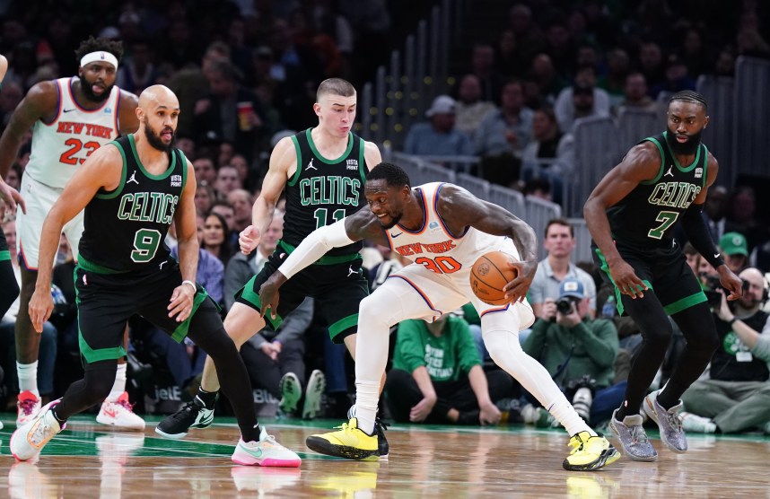 New York Knicks forward Julius Randle (30) drives the ball against Boston Celtics guard Payton Pritchard (11) in the second quarter at TD Garden