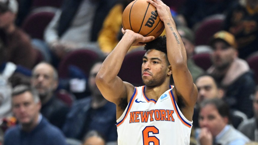 New York Knicks guard Quentin Grimes (6) shoots in the first quarter against the Cleveland Cavaliers at Rocket Mortgage FieldHouse