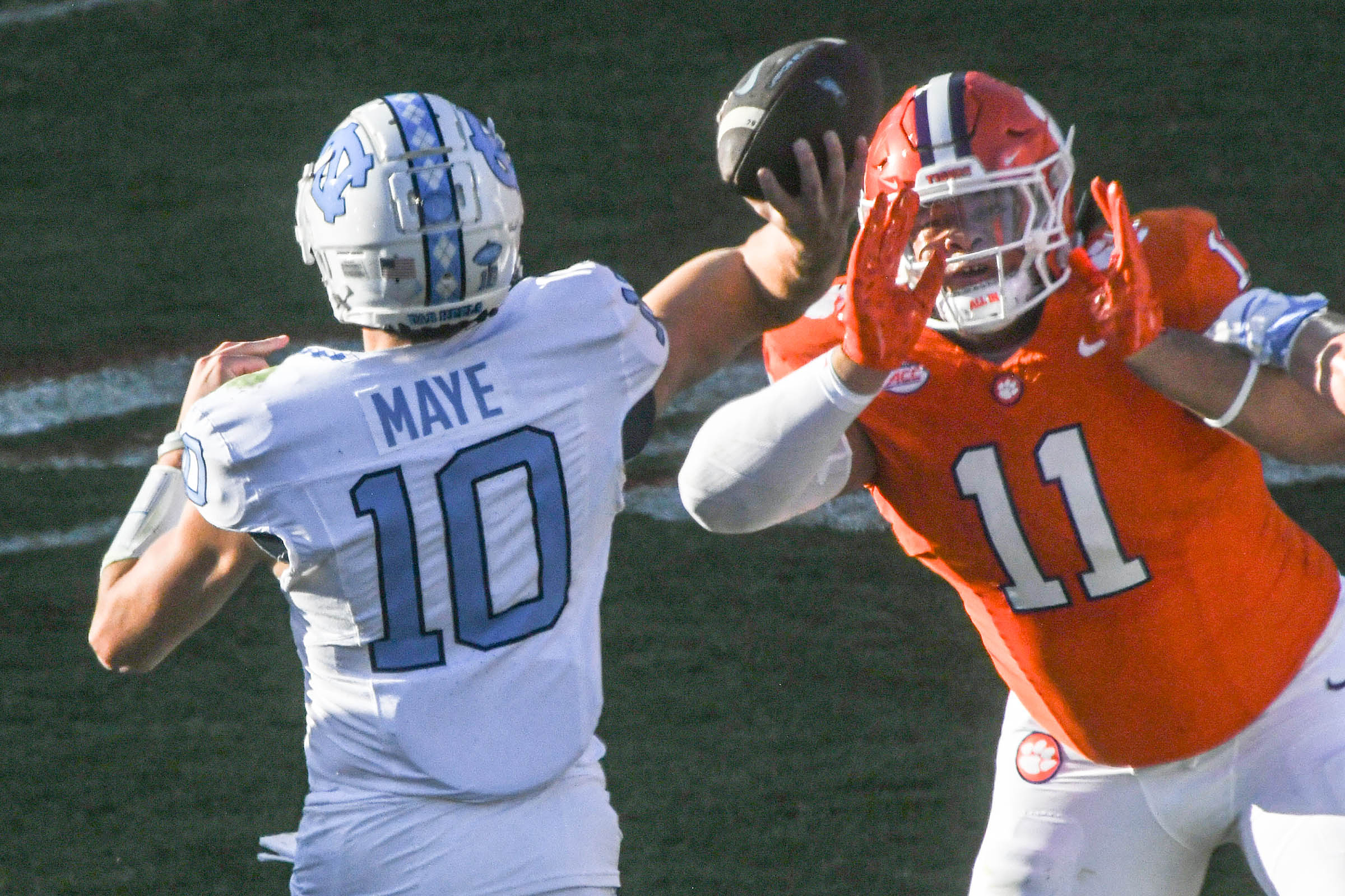 Clemson Tigers defensive lineman Peter Woods (11) pressures North Carolina Tar Heels quarterback Drake Maye (10) during the first quarter at Memorial Stadium (New York Giants)