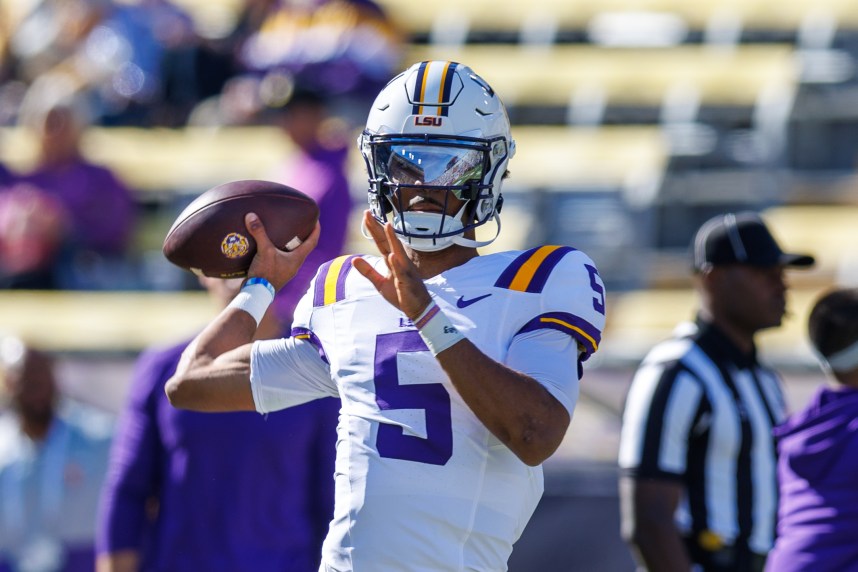 LSU Tigers quarterback Jayden Daniels (5) (New York Giants prospect) during warmups before the game against the Texas A&M Aggies at Tiger Stadium