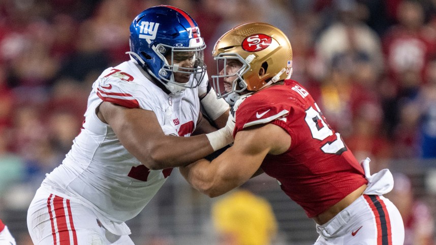 New York Giants offensive tackle Evan Neal (73) blocks San Francisco 49ers defensive end Nick Bosa (97) during the fourth quarter at Levi's Stadium