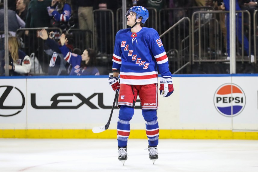 New York Rangers left wing Will Cuylle (50) looks up at the scoreboard after scoring a goal in the third period against the Carolina Hurricanes at Madison Square Garden
