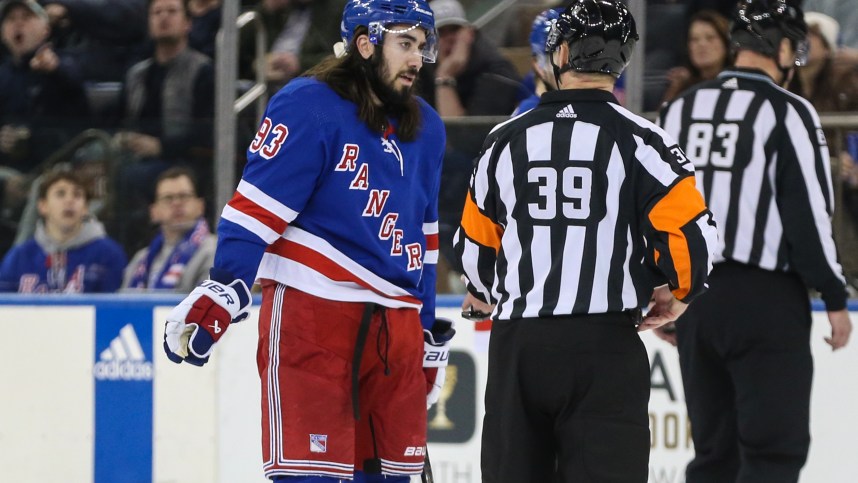 New York Rangers center Mika Zibanejad (93) argues with referee Brandon Blandina (39) in the first period against the Columbus Blue Jackets at Madison Square Garden
