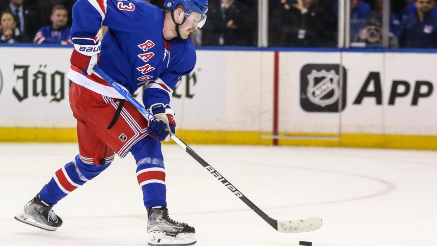 New York Rangers left wing Alexis Lafreniere (13) scores the game winning goal in a shootout against the Columbus Blue Jackets at Madison Square Garden