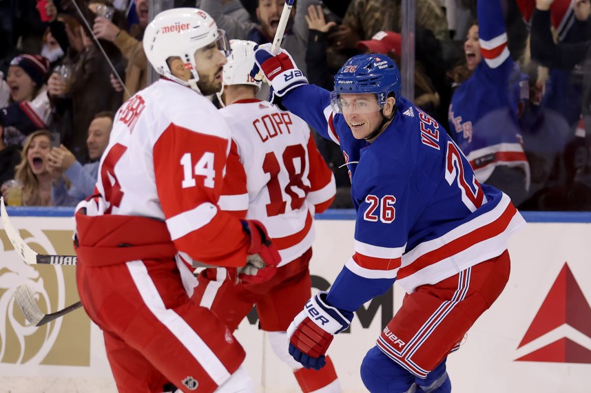 New York Rangers left wing Jimmy Vesey (26) celebrates his game winning goal in front of Detroit Red Wings center Robby Fabbri (14) and center Andrew Copp (18) during the third period at Madison Square Garden
