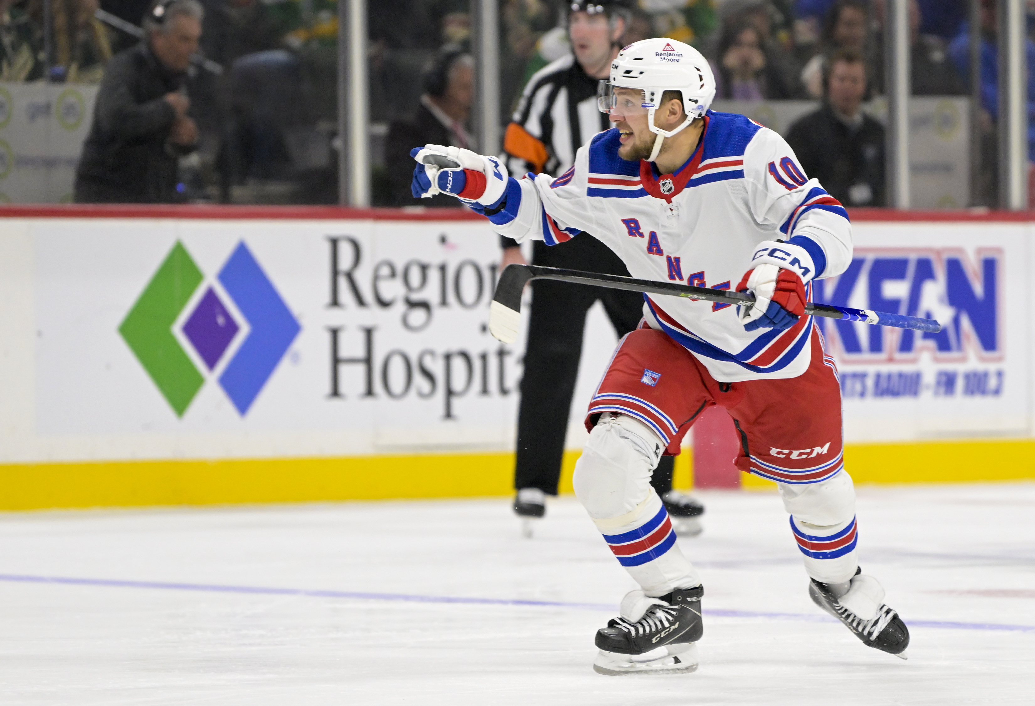 New York Rangers forward Artemi Panarin (10) celebrates the goal he assisted on by forward Chris Kreider (20) against the Minnesota Wild during the third period at Xcel Energy Center