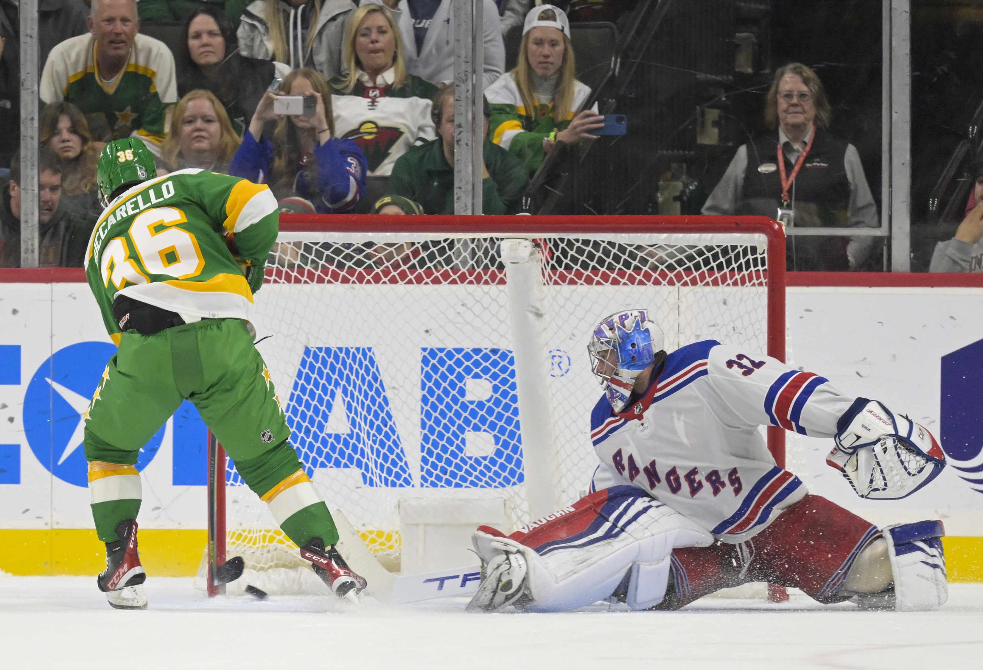 Minnesota Wild forward Mats Zuccarello (36) beats New York Rangers goalie Jonathan Quick (32) for a goal during a shootout at Xcel Energy Center