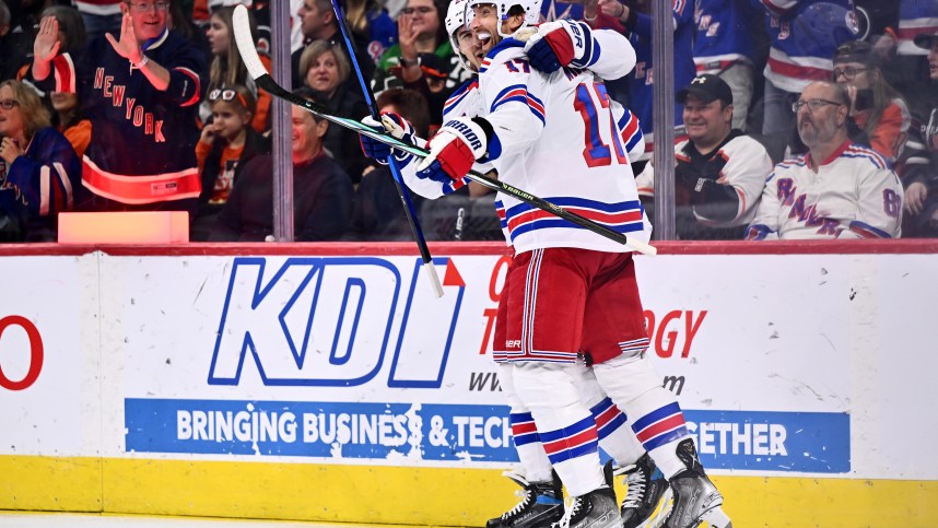 New York Rangers right wing Blake Wheeler (17) celebrates with left wing Chris Kreider (20) after scoring a goal against the Philadelphia Flyers in the first period at Wells Fargo Center