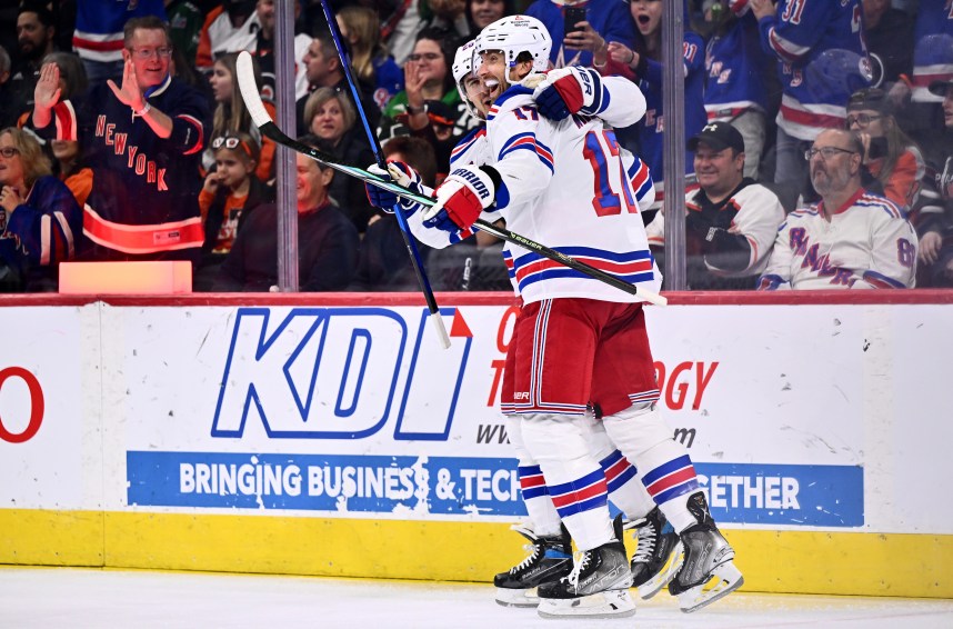 New York Rangers right wing Blake Wheeler (17) celebrates with left wing Chris Kreider (20) after scoring a goal against the Philadelphia Flyers in the first period at Wells Fargo Center