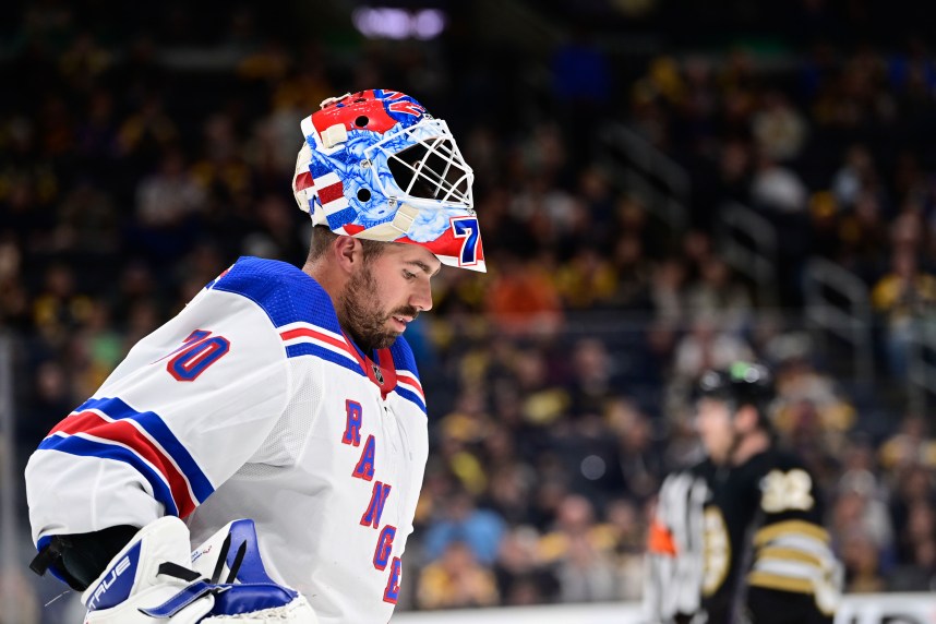 New York Rangers goalie Louis Domingue (70)  waits for play to begin against the Boston Bruins during the third period at TD Garden