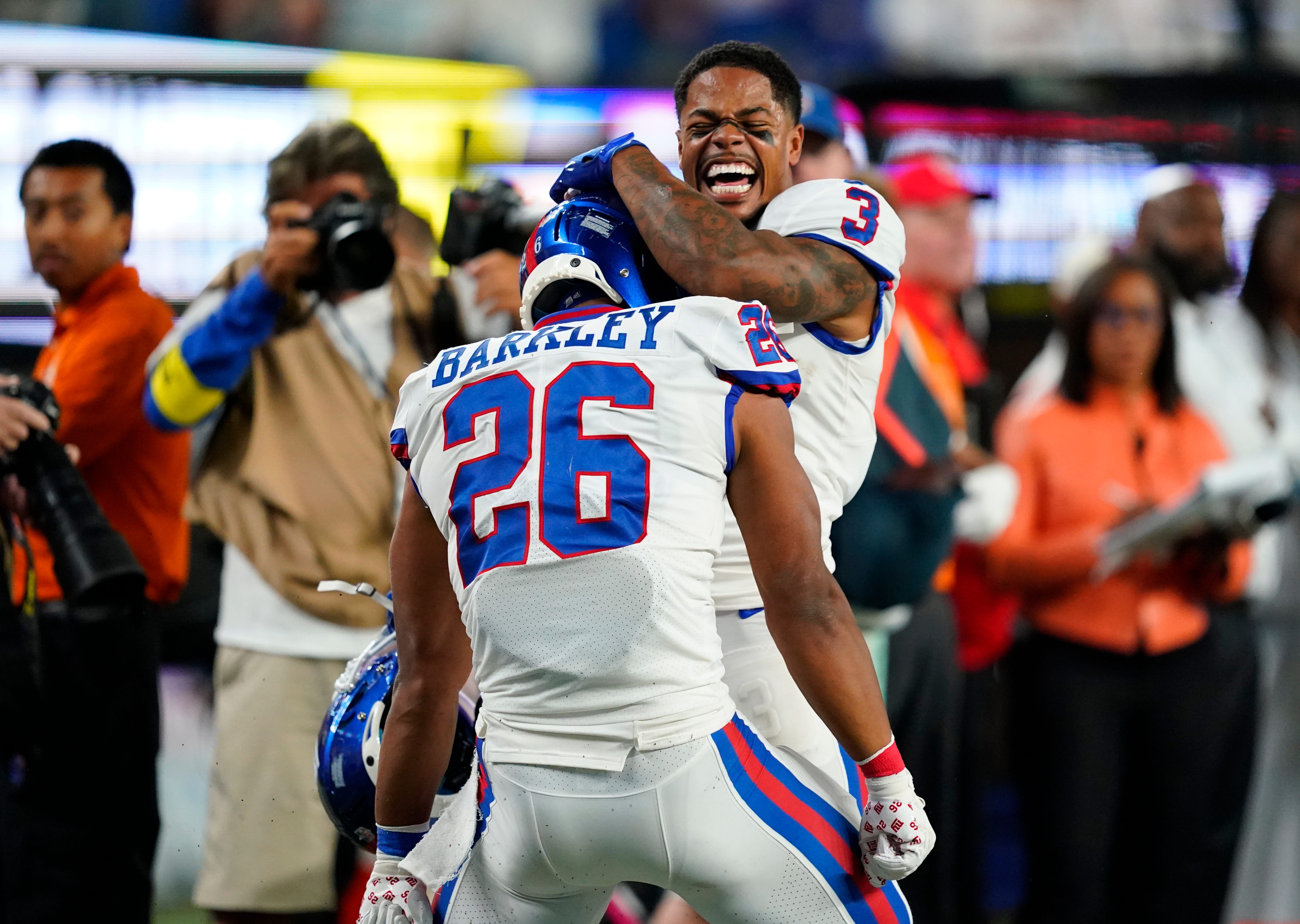 New York Giants wide receiver Sterling Shepard (3) and running back Saquon Barkley (26) celebrate Barkley's rushing touchdown in the second half