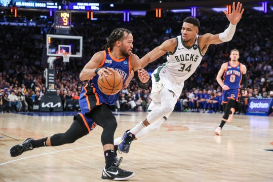 New York Knicks guard Jalen Brunson (11) looks to drive past Milwaukee Bucks forward Giannis Antetokounmpo (34) in the second quarter at Madison Square Gar