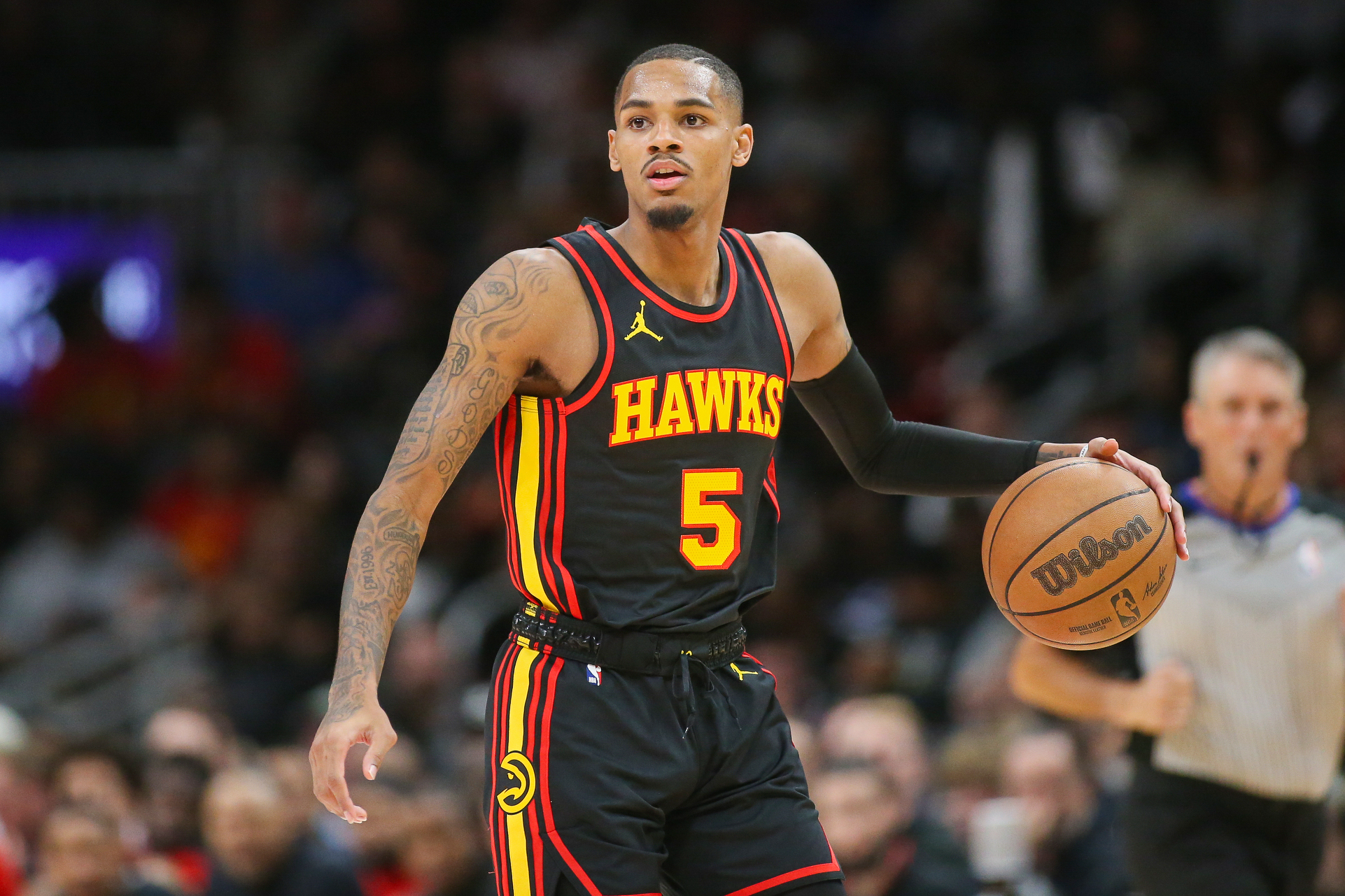 Atlanta Hawks guard Dejounte Murray (5) dribbles against the New York Knicks in the second half at State Farm Arena