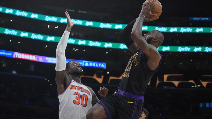 Los Angeles Lakers forward LeBron James (23) shoots the ball against New York Knicks forward Julius Randle (30) in the second half at Crypto.com Arena