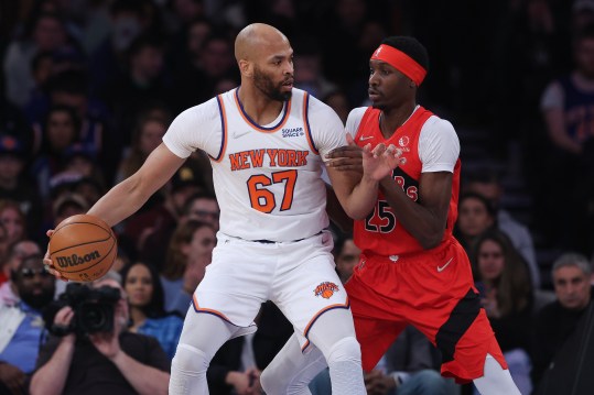 New York Knicks center Taj Gibson (67) dribbles against Toronto Raptors forward Chris Boucher (25) during the first half at Madison Square Garden