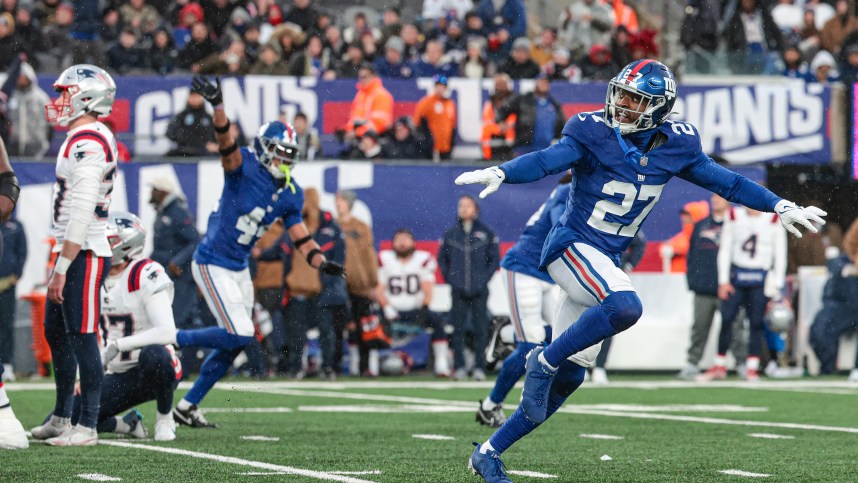 New York Giants safety Jason Pinnock (27) celebrates after New England Patriots place kicker Chad Ryland (37) misses a field goal during the fourth quarter at MetLife Stadium