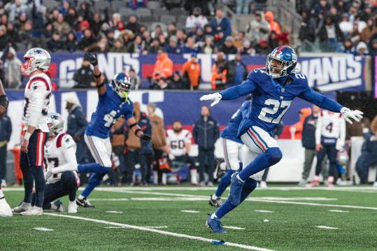 New York Giants safety Jason Pinnock (27) celebrates after New England Patriots place kicker Chad Ryland (37) misses a field goal during the fourth quarter at MetLife Stadium