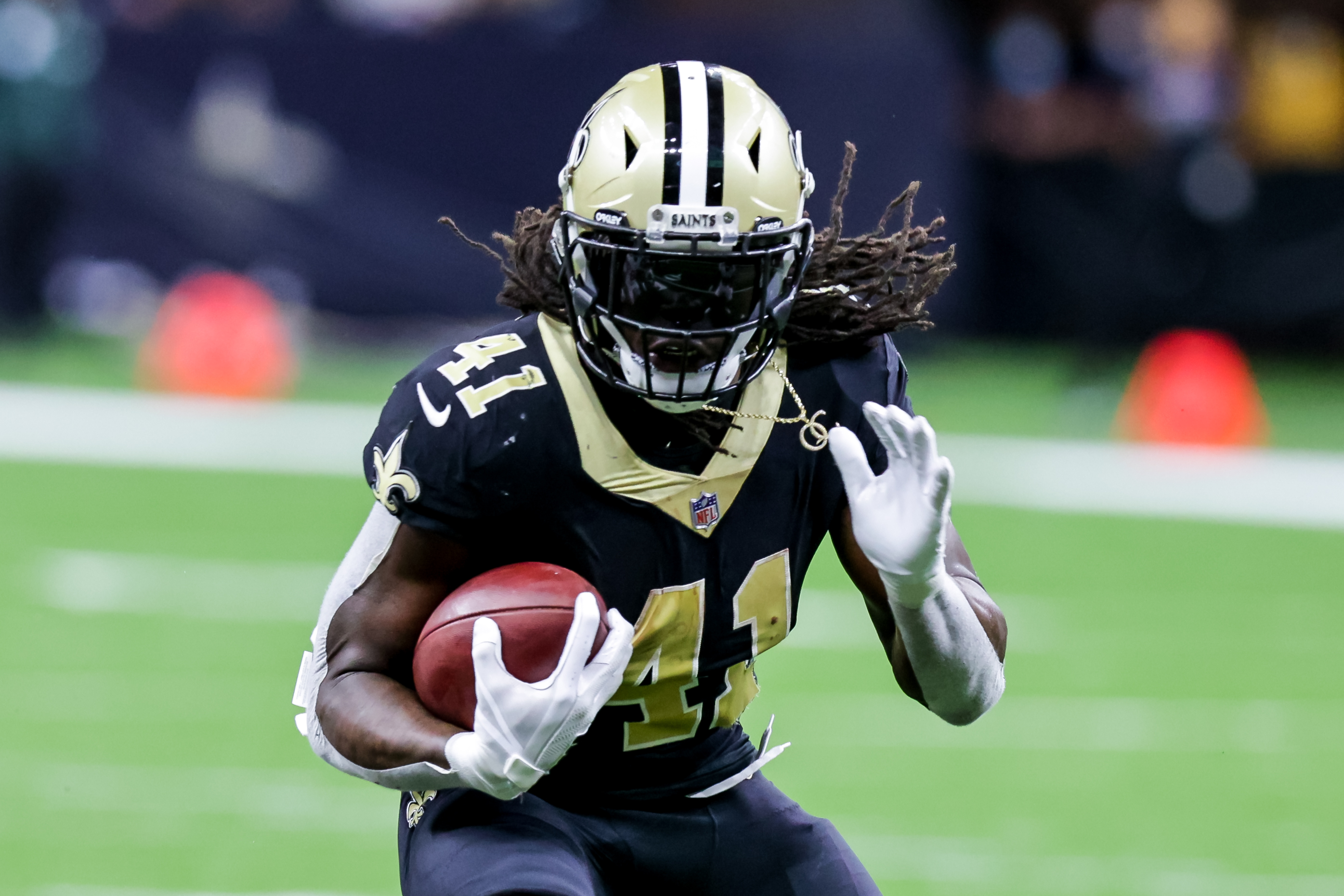 New Orleans Saints running back Alvin Kamara (41) runs in open field against New York Giants during the second half at Caesars Superdome