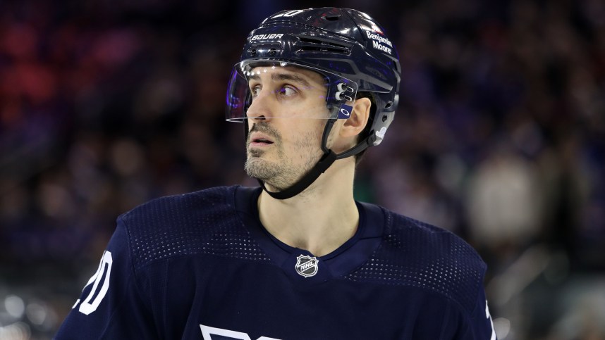 New York Rangers left wing Chris Kreider (20) skates against the Los Angeles Kings during the third period at Madison Square Garden