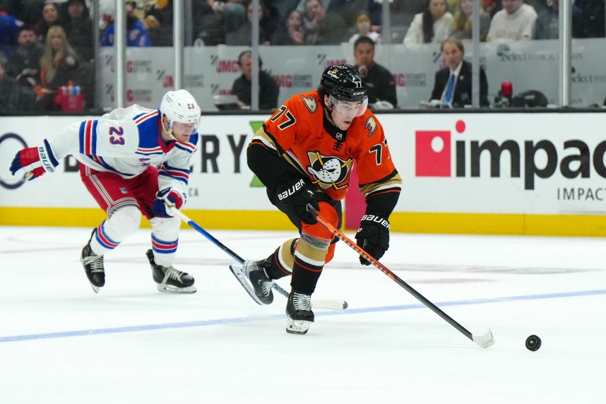 Anaheim Ducks right wing Frank Vatrano (77) skates with the puck against New York Rangers defenseman Adam Fox (23) in the second period at Honda Center