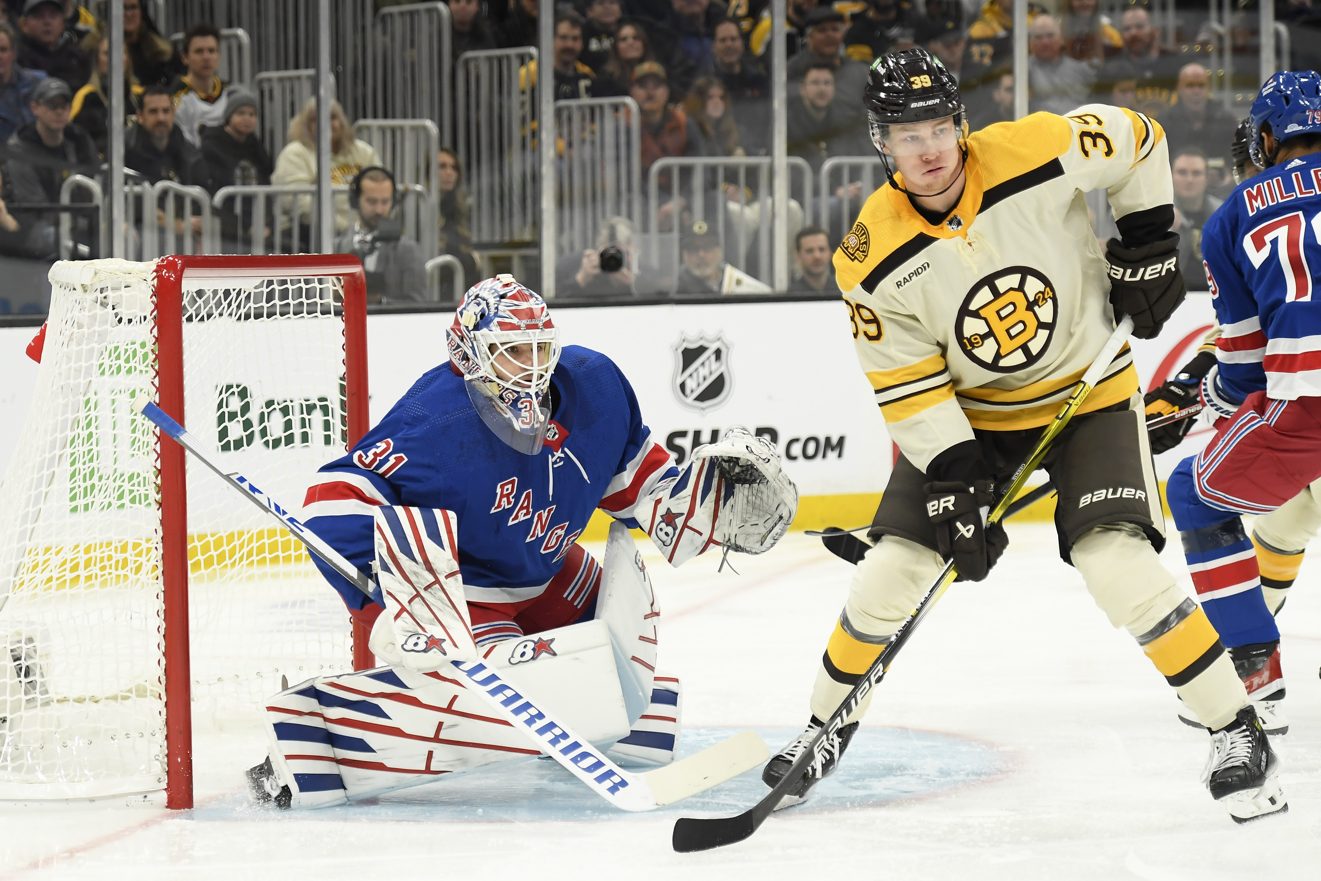 New York Rangers goaltender Igor Shesterkin (31) watches the puck in front of Boston Bruins center Morgan Geekie (39) during the first period at TD Garden