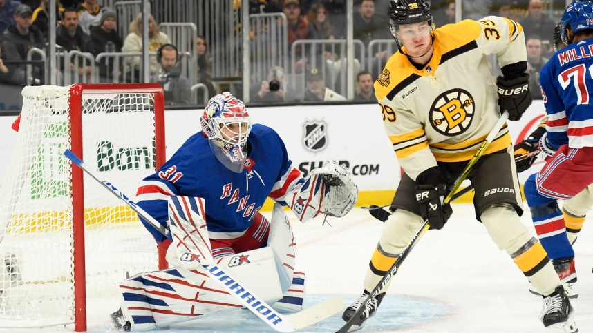 New York Rangers goaltender Igor Shesterkin (31) watches the puck in front of Boston Bruins center Morgan Geekie (39) during the first period at TD Garden