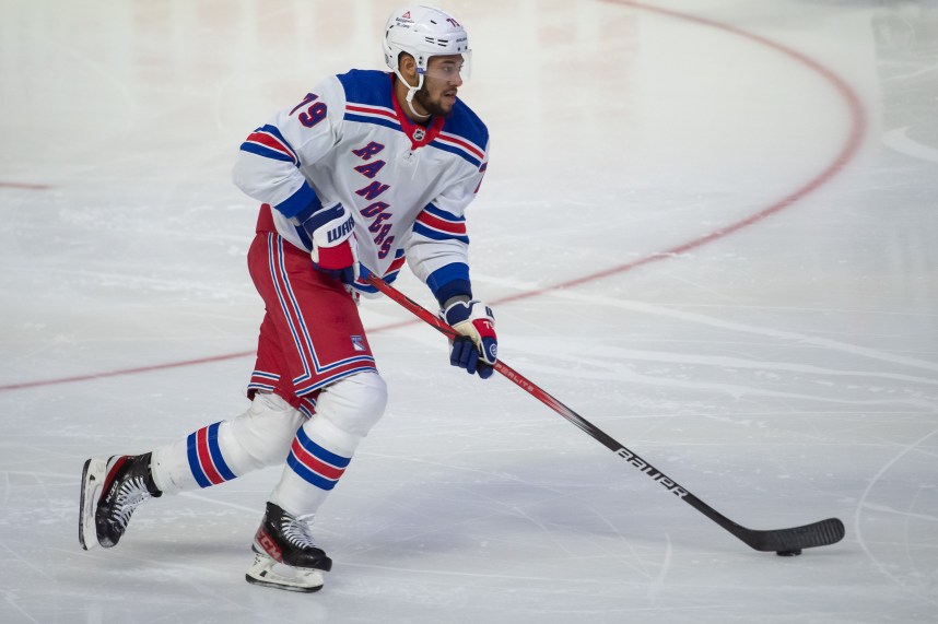 New York Rangers defenseman K'Andre Miller (79) skates with the puck in the third period against the Ottawa Senators at the Canadian Tire Centre