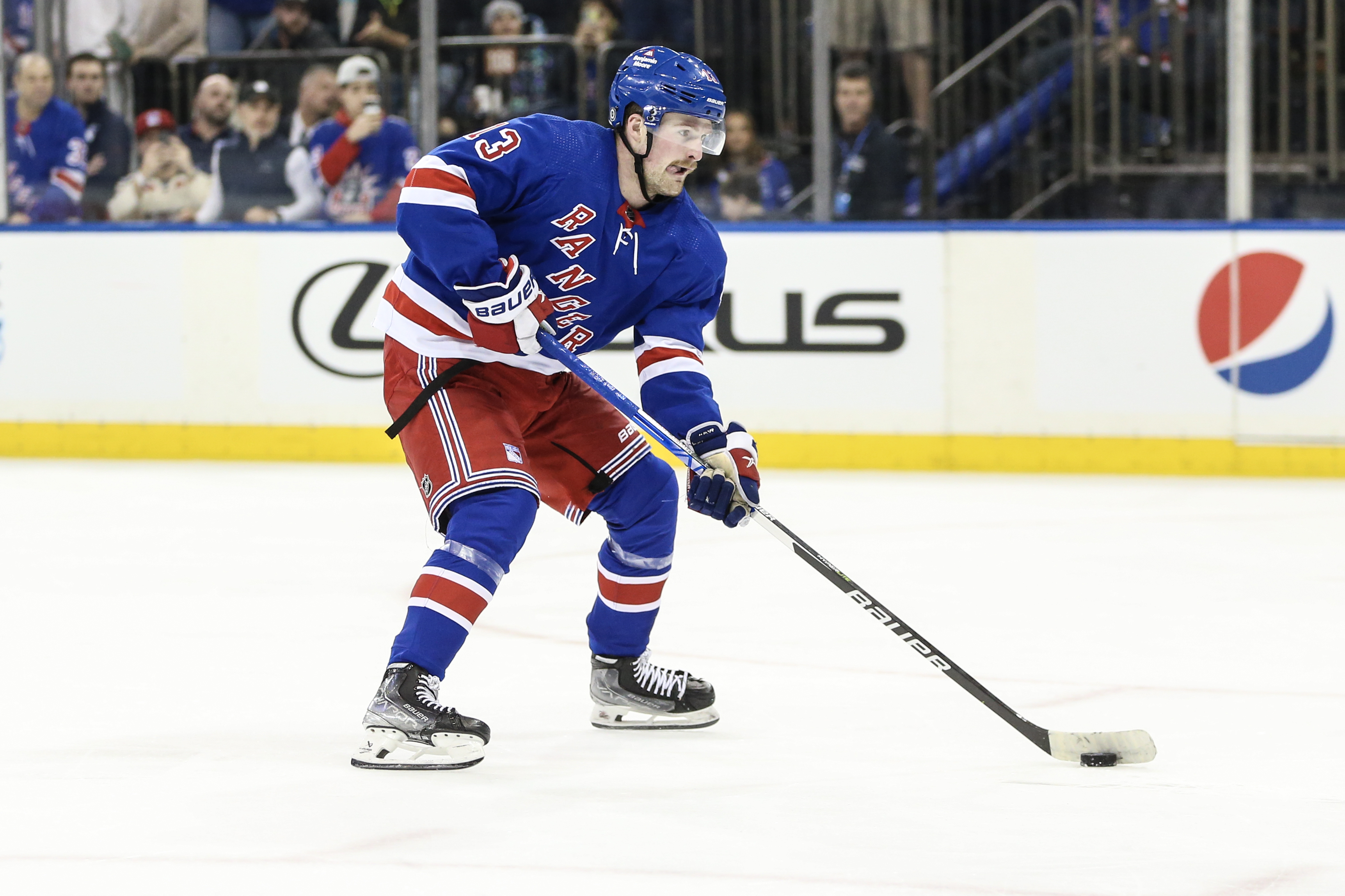 New York Rangers left wing Alexis Lafreniere (13) skates down ice during a penalty shot attempt in the second period against the San Jose Sharks at Madison Square Garden