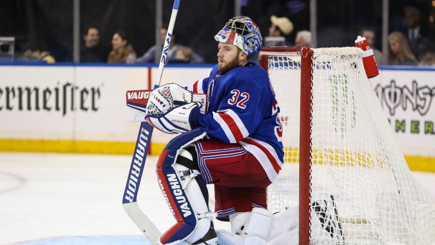 New York Rangers goaltender Jonathan Quick (32) gets ready for play to resume in the third period against the San Jose Sharks at Madison Square Garden