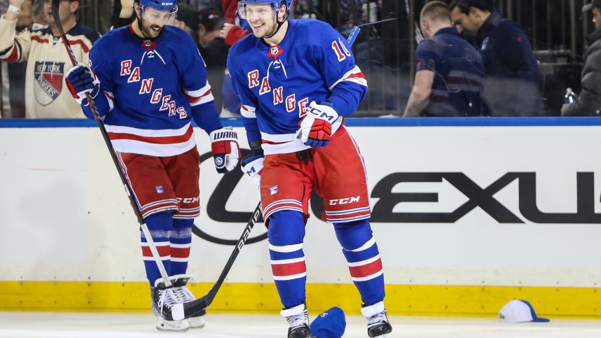 New York Rangers left wing Artemi Panarin (10) reacts after scoring his third goal of the game in the third period against the San Jose Sharks at Madison Square Garden