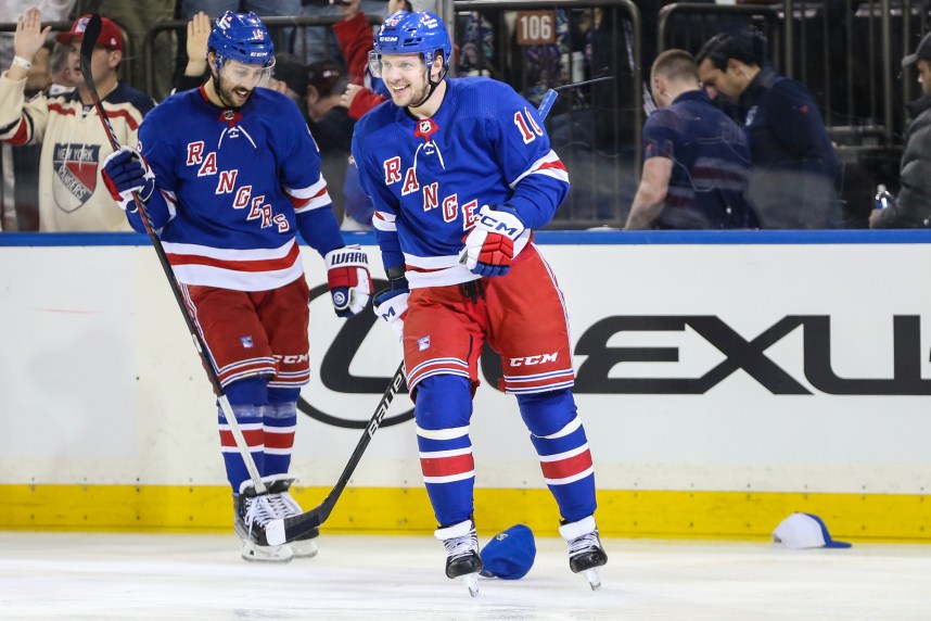New York Rangers left wing Artemi Panarin (10) reacts after scoring his third goal of the game in the third period against the San Jose Sharks at Madison Square Garden