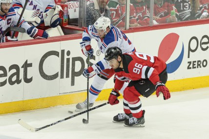 New York Rangers right wing Vladimir Tarasenko (91) battles New Jersey Devils right wing Timo Meier (96) for the puck during the first period in game seven of the first round of the 2023 Stanley Cup Playoffs at Prudential Center