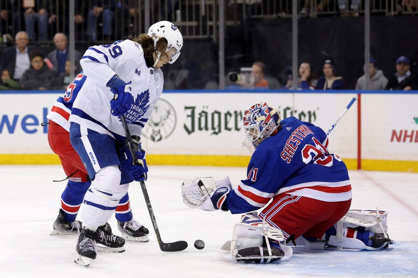 Toronto Maple Leafs left wing Tyler Bertuzzi (59) takes a shot against New York Rangers goaltender Igor Shesterkin (31) during the third period at Madison Square Garden