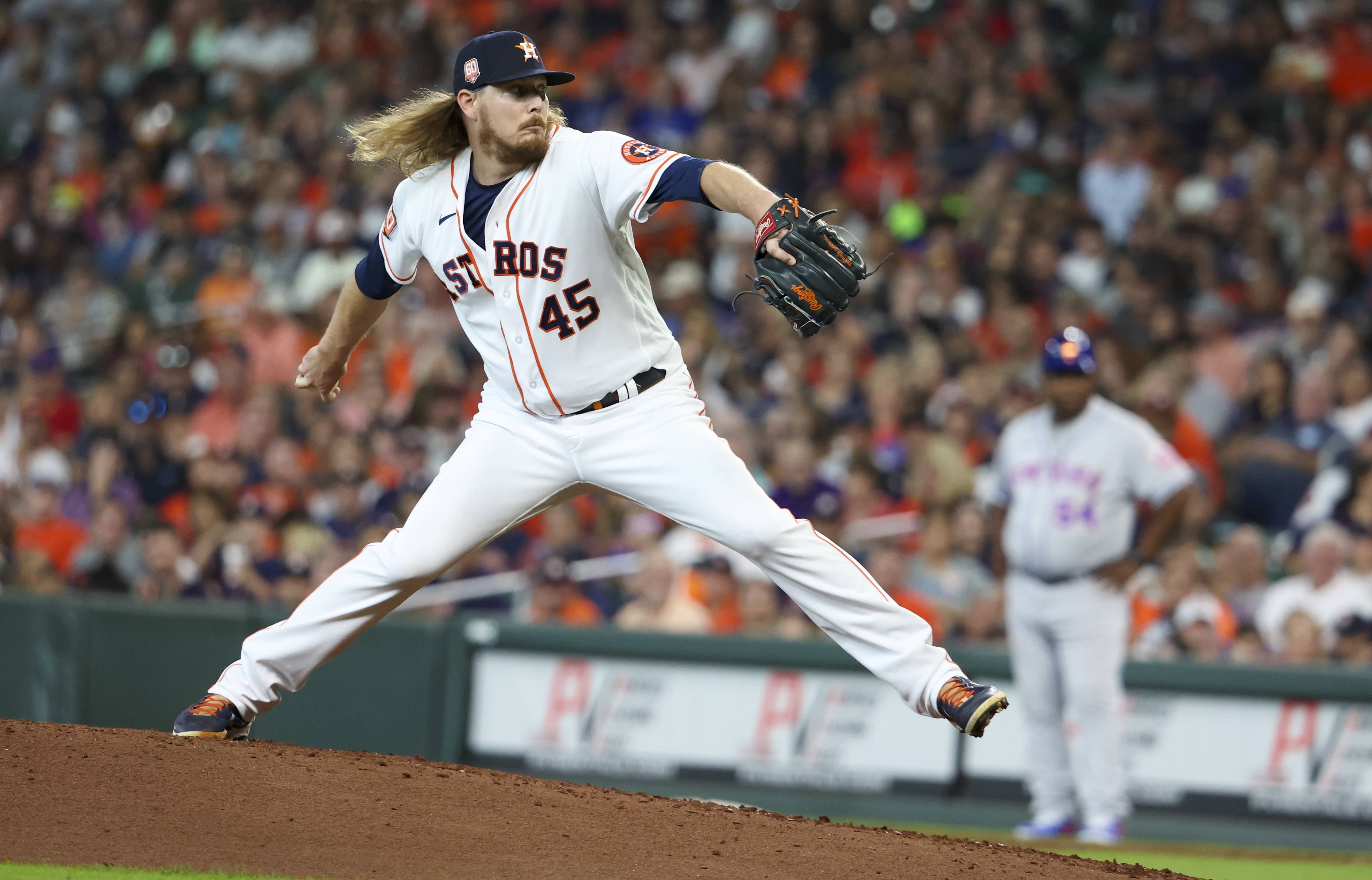 Houston Astros relief pitcher Ryne Stanek (45) pitches against the New York Mets in the sixth inning at Minute Maid Park