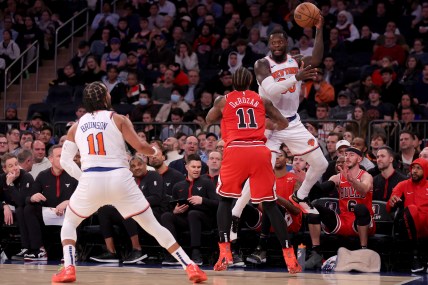 New York Knicks forward Julius Randle (30) looks to pass the ball to guard Jalen Brunson (11) after stealing a pass intended for Chicago Bulls forward DeMar DeRozan (11) during the third quarter at Madison Square Garden