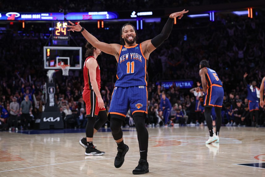 New York Knicks guard Jalen Brunson (11) reacts after making a three point basket during the second half against the Miami Heat at Madison Square Garden