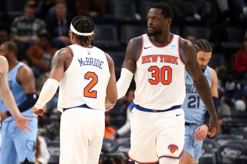 New York Knicks forward Julius Randle (30) reacts with New York Knicks guard Miles McBride (2) during the second half against the Memphis Grizzlies at FedExForum