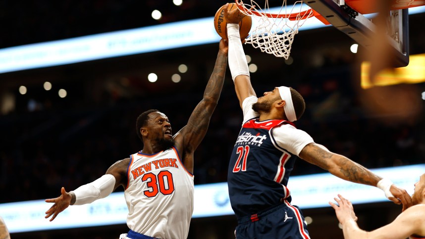 Washington Wizards center Daniel Gafford (21) blocks the shot of New York Knicks forward Julius Randle (30) in the second quarter at Capital One Arena